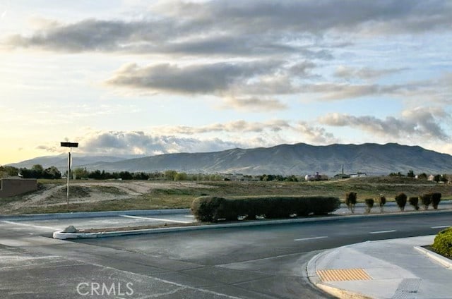 19238 Olive Way, Apple Valley, CA 92308 - view of street featuring a mountain view, sidewalks, and curbs