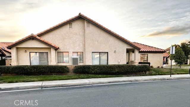 19238 Olive Way, Apple Valley, CA 92308 - exterior space with stucco siding and a tiled roof