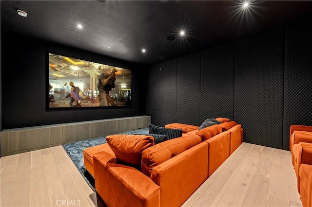home theater with recessed lighting and hardwood / wood-style flooring