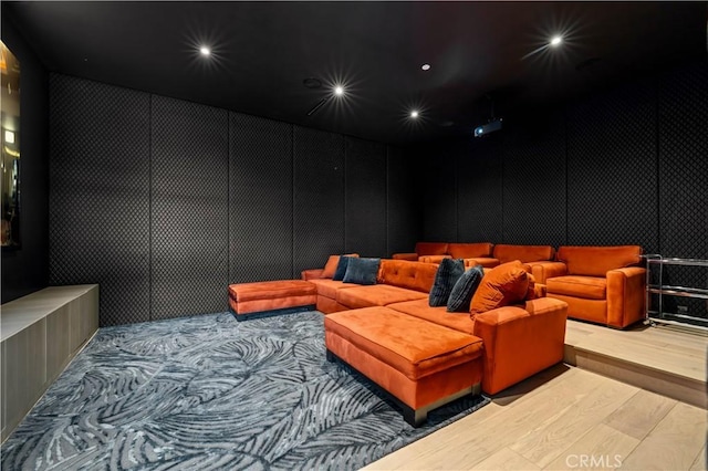 cinema room featuring recessed lighting and wood finished floors