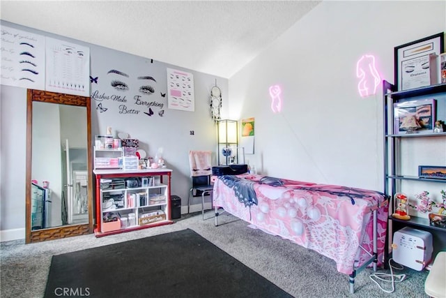 7801 Pinyon Ave, Fontana, CA 92336 - carpeted bedroom featuring baseboards, lofted ceiling, and a textured ceiling