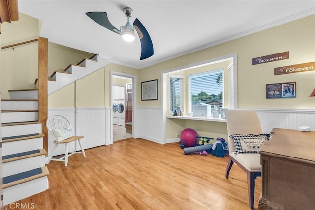 19903 E Rambling Rd, Covina, CA 91724 - sitting room featuring ceiling fan, wood finished floors, stairs, crown molding, and a wainscoted wall