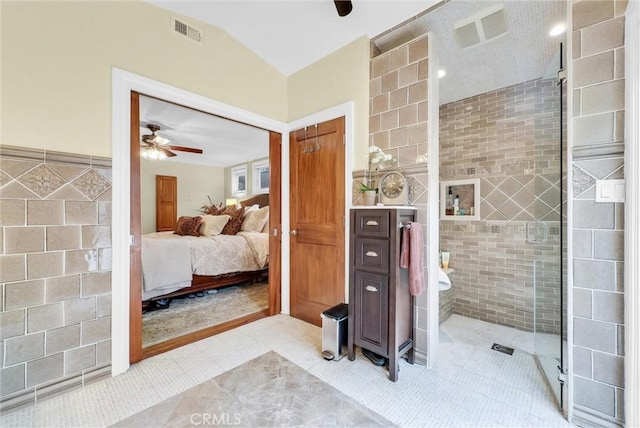19903 E Rambling Rd, Covina, CA 91724 - bathroom with ceiling fan, ensuite bathroom, a stall shower, tile walls, and tile patterned floors