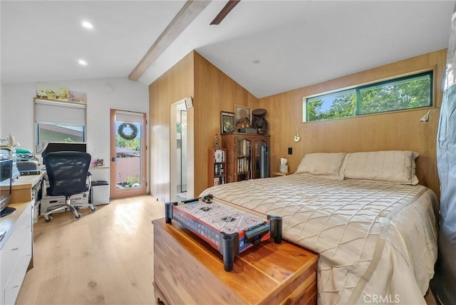 19903 E Rambling Rd, Covina, CA 91724 - bedroom with a desk, light wood-style floors, wood walls, access to outside, and a ceiling fan