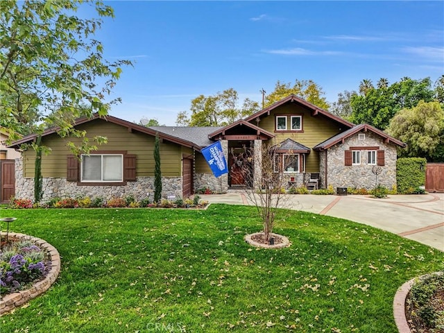 19903 E Rambling Rd, Covina, CA 91724 - craftsman-style house featuring stone siding and curved driveway