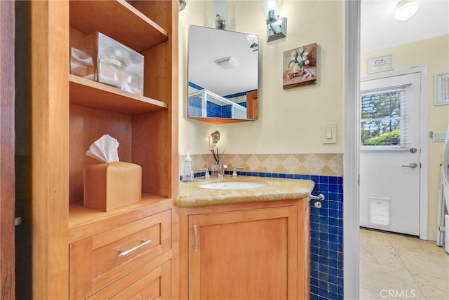 19903 E Rambling Rd, Covina, CA 91724 - bathroom featuring vanity, tile walls, and tile patterned floors