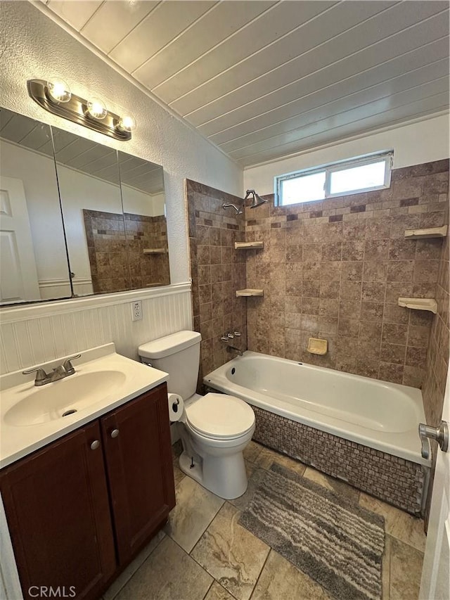 full bathroom with tub / shower combination, toilet, and vanity