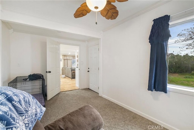 9714 San Benito Ave, Gerber, CA 96035 - carpeted bedroom with ornamental molding, baseboards, multiple windows, and ceiling fan