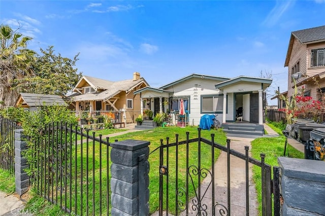 961 W 47th St, Los Angeles, CA 90037 - view of front of home with a gate