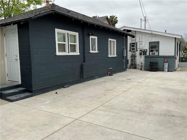 961 W 47th St, Los Angeles, CA 90037 - view of side of property featuring a patio area