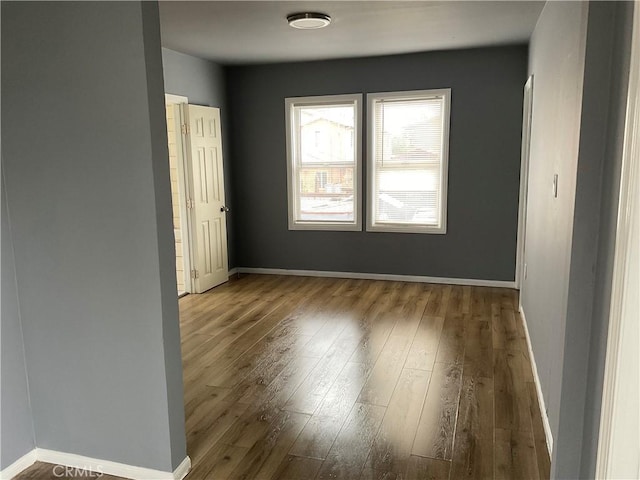 961 W 47th St, Los Angeles, CA 90037 - spare room featuring wood finished floors and baseboards