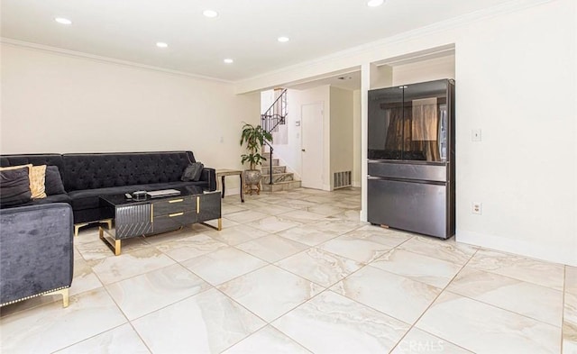 living room featuring recessed lighting, stairs, and crown molding