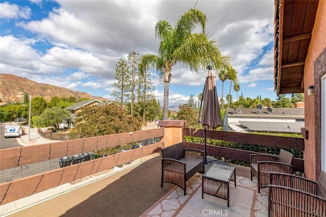 view of patio / terrace with outdoor lounge area and a mountain view