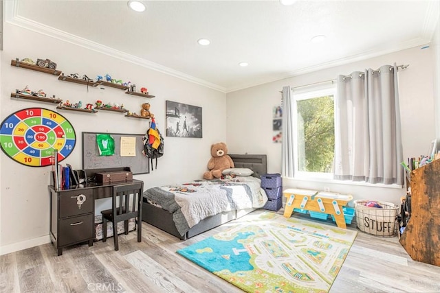 bedroom featuring baseboards, recessed lighting, wood finished floors, and crown molding