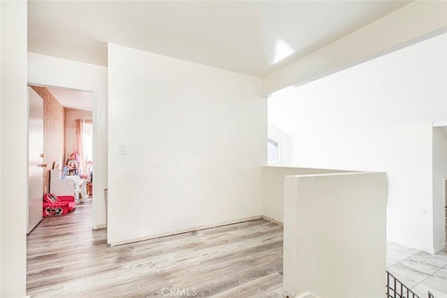 unfurnished room featuring wood finished floors