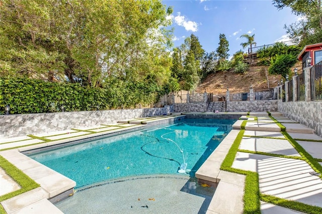 view of pool with a fenced in pool and a fenced backyard