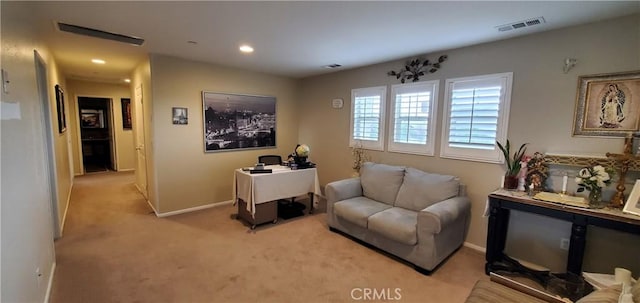 sitting room featuring baseboards, visible vents, recessed lighting, and carpet
