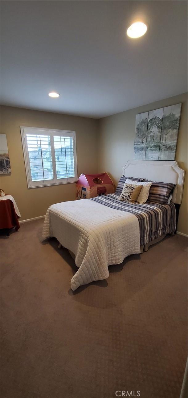 carpeted bedroom with baseboards and recessed lighting