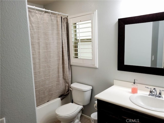 full bathroom featuring toilet, vanity, and shower / bath combo