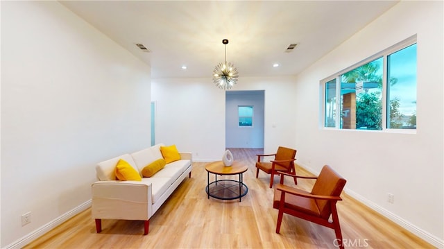 411 W Plum St, Compton, CA 90222 - living area featuring light wood-type flooring, baseboards, and recessed lighting