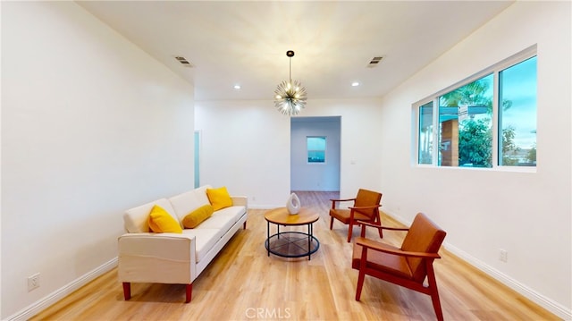411 W Plum St, Compton, CA 90222 - living area with light wood-type flooring, baseboards, and recessed lighting