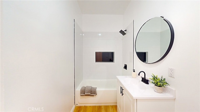 411 W Plum St, Compton, CA 90222 - full bathroom with vanity, wood finished floors, and tub / shower combination