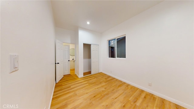 411 W Plum St, Compton, CA 90222 - unfurnished room with light wood-type flooring, baseboards, and recessed lighting