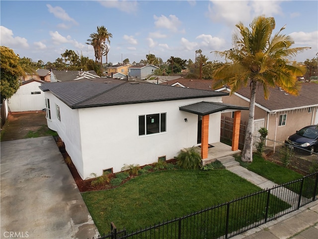 411 W Plum St, Compton, CA 90222 - view of front of house with stucco siding and roof with shingles
