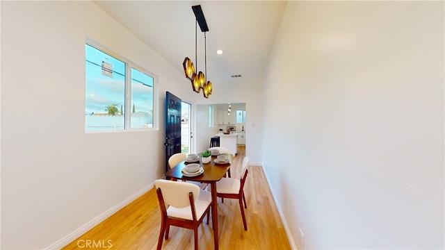 411 W Plum St, Compton, CA 90222 - dining space with light wood finished floors, baseboards, and recessed lighting
