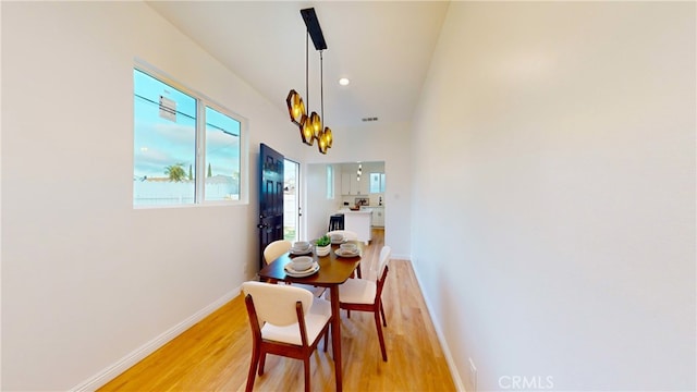 411 W Plum St, Compton, CA 90222 - dining area with light wood finished floors, baseboards, and recessed lighting
