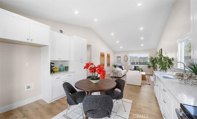 10620 Gemini Dr, Riverside, CA 92503 - dining space with recessed lighting, visible vents, a wealth of natural light, and light wood-type flooring