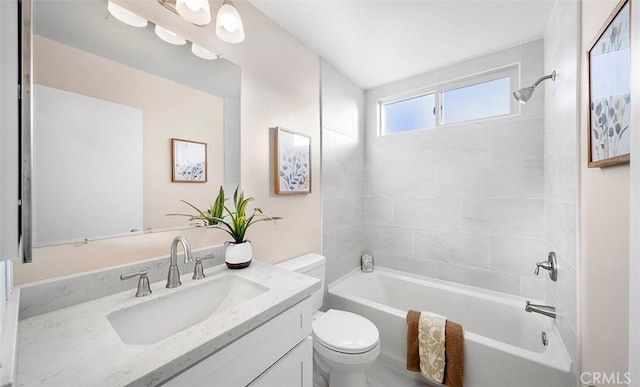 10620 Gemini Dr, Riverside, CA 92503 - full bathroom featuring vanity, washtub / shower combination, and toilet