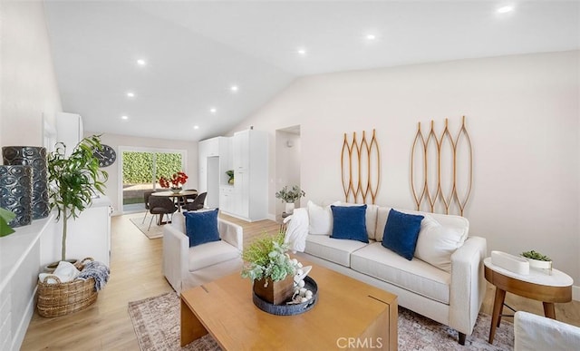 10620 Gemini Dr, Riverside, CA 92503 - living area featuring recessed lighting, vaulted ceiling, and light wood-style flooring