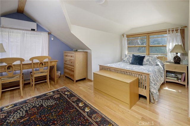 29 Bear Dr, Mt Baldy, CA 91759 - bedroom featuring an AC wall unit, lofted ceiling, and wood finished floors