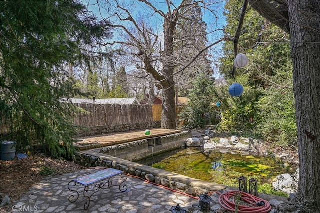 29 Bear Dr, Mt Baldy, CA 91759 - view of yard featuring a patio area and fence