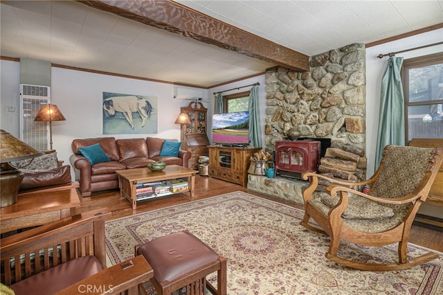 29 Bear Dr, Mt Baldy, CA 91759 - living area with a wall mounted AC, wood finished floors, a wood stove, and ornamental molding