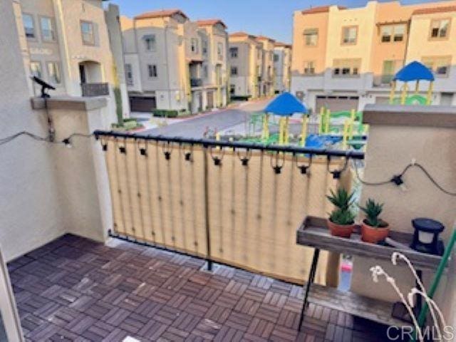 balcony featuring a residential view