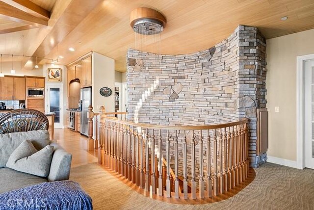 2062 Sherwood Dr, Cambria, CA 93428 - bedroom with freestanding refrigerator, wood ceiling with exposed beams, recessed lighting, and light wood finished floors