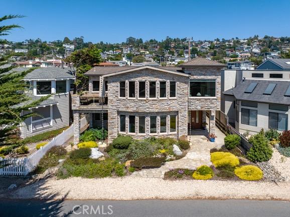 2062 Sherwood Dr, Cambria, CA 93428 - view of front facade featuring stone siding and a residential view