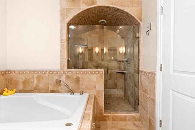 2062 Sherwood Dr, Cambria, CA 93428 - bathroom featuring a bath and a shower stall