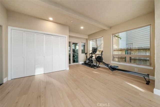 2062 Sherwood Dr, Cambria, CA 93428 - workout area featuring wood finished floors, recessed lighting, and baseboards