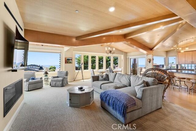 2062 Sherwood Dr, Cambria, CA 93428 - living room with a chandelier, wooden ceiling, and recessed lighting