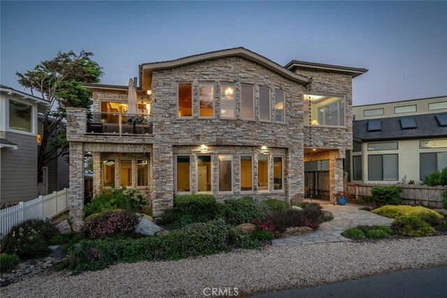 2062 Sherwood Dr, Cambria, CA 93428 - view of front facade with a balcony and stone siding