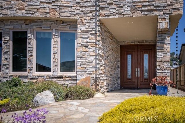 2062 Sherwood Dr, Cambria, CA 93428 - view of exterior entry with stone siding