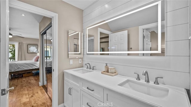 10 Via Garceta, Rancho Santa Margarita, CA 92688 - ensuite bathroom with a sink, a ceiling fan, connected bathroom, and wood finished floors