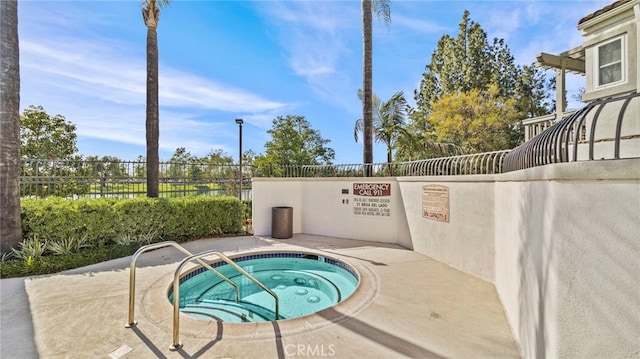 10 Via Garceta, Rancho Santa Margarita, CA 92688 - view of swimming pool with fence and a hot tub