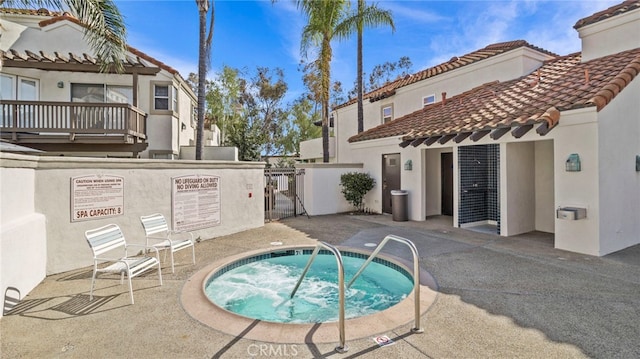 10 Via Garceta, Rancho Santa Margarita, CA 92688 - view of pool featuring a patio, an outdoor kitchen, and a community hot tub