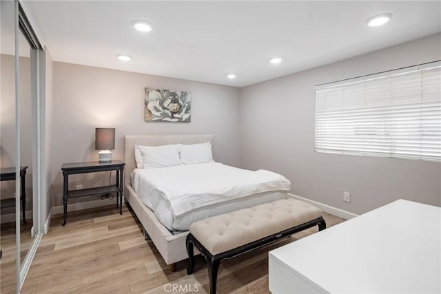 2208 The Strand, Manhattan Beach, CA 90266 - bedroom featuring recessed lighting, baseboards, light wood-style flooring, and a closet