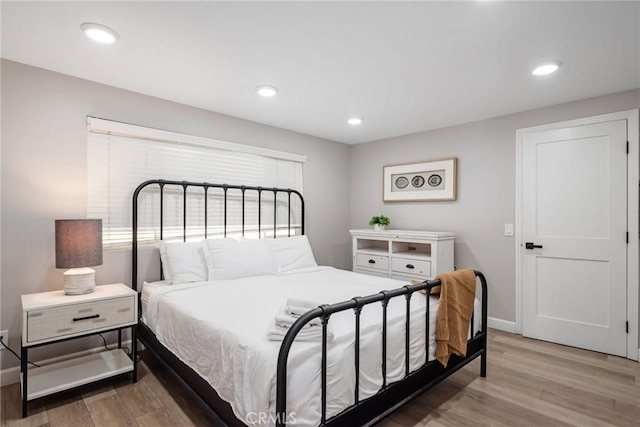 2208 The Strand, Manhattan Beach, CA 90266 - bedroom with light wood-style flooring, baseboards, and recessed lighting