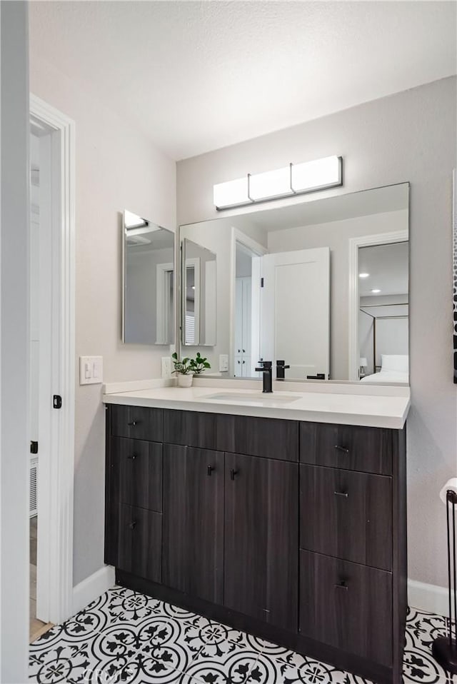 2208 The Strand, Manhattan Beach, CA 90266 - bathroom with baseboards and vanity